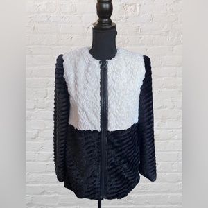 Alice and Olivia faux fur jacket. Size XS. Woman’s black and white zipper front.